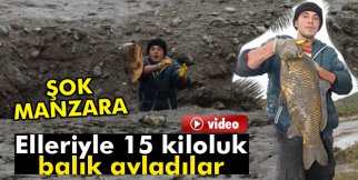 Elleriyle 15 kiloluk balık yakaladı